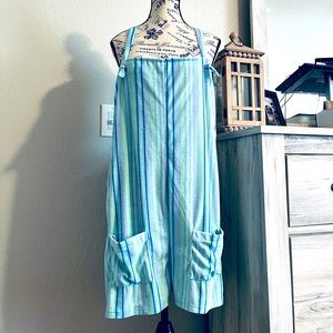 Get ready for the beach with this 100% polyester lounging jumpsuit!